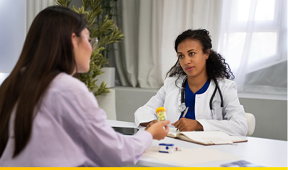a lady discussing with a medical professional